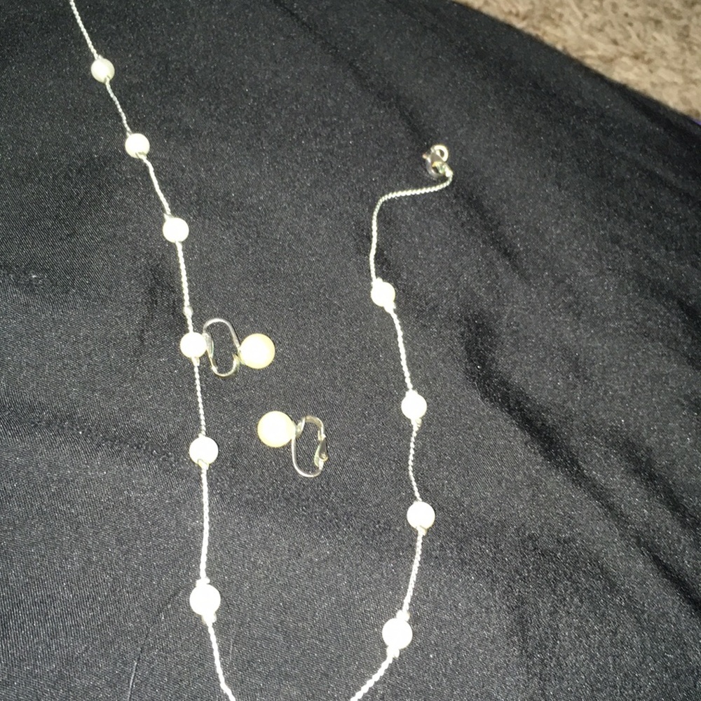 Women’s clip on earrings and necklace